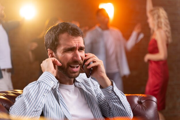 Close up man talking on phone