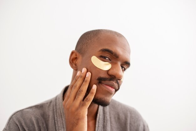 Close up man wearing eyepatch