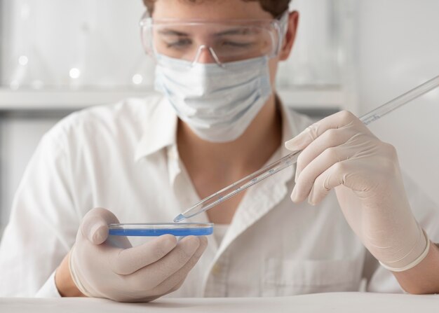 Close-up man wearing goggles and mask