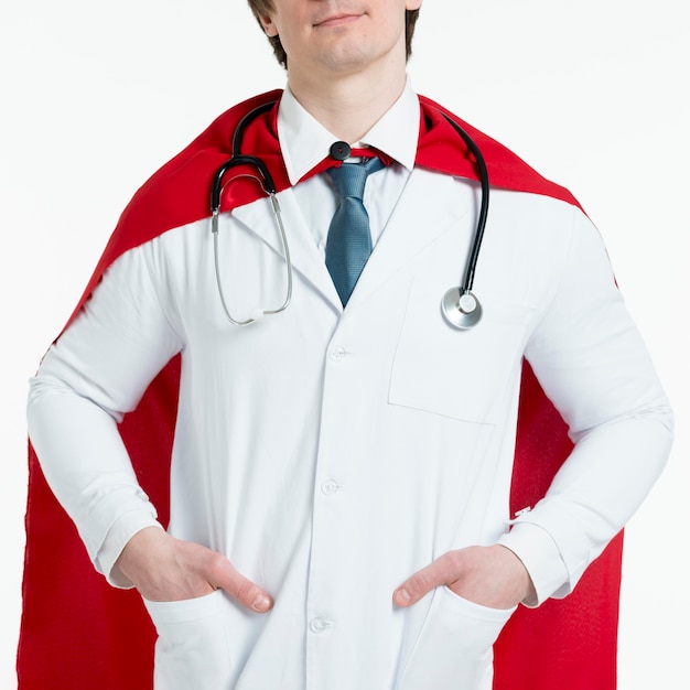 Close-up man wearing red cape