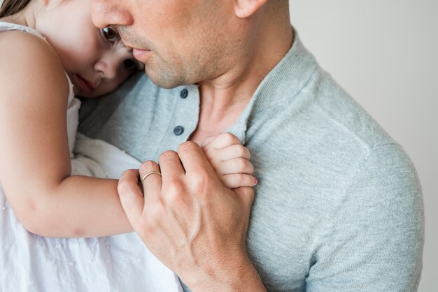 Close up of man with daughter