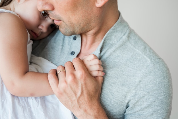 Close up of man with daughter