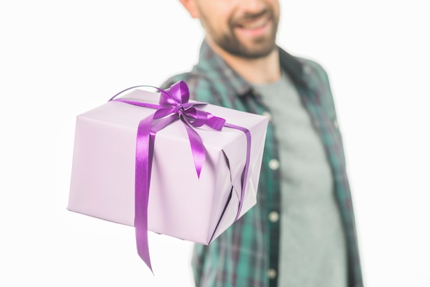 Close-up of a man with gift box