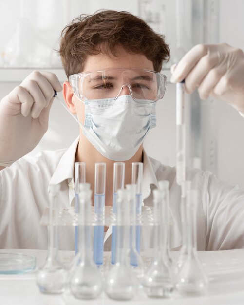 Close-up man with goggles and mask