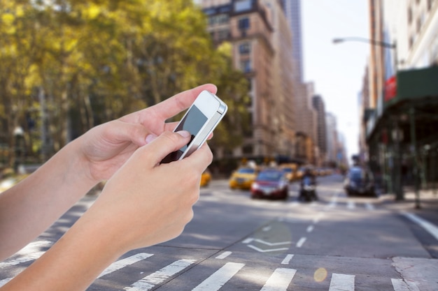 Close-up of man with mobile on blurred background