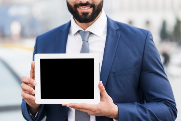 Close-up man with tablet