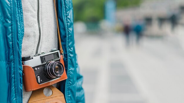 Close-up man with vintage camera