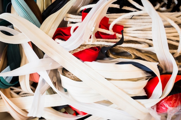 Close-up of many ribbons in tailor shop