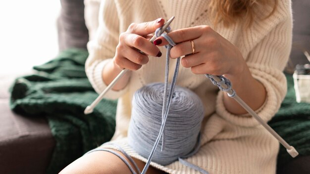 Close-up married woman crocheting