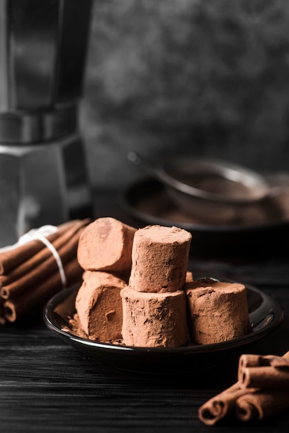 Close-up marshmallows covered in cocoa powder