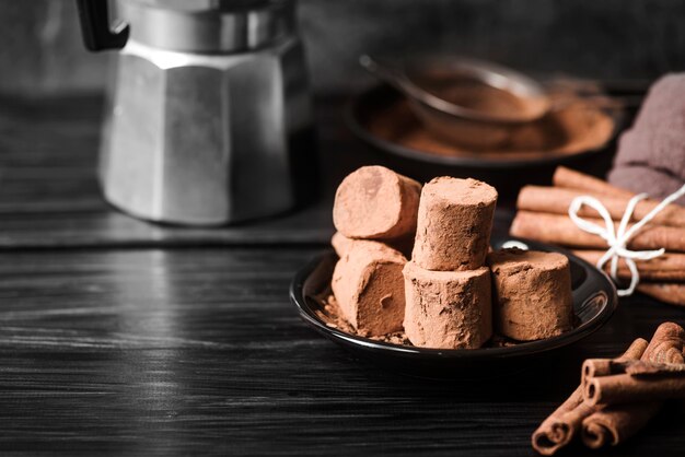 Close-up marshmallows covered in cocoa powder