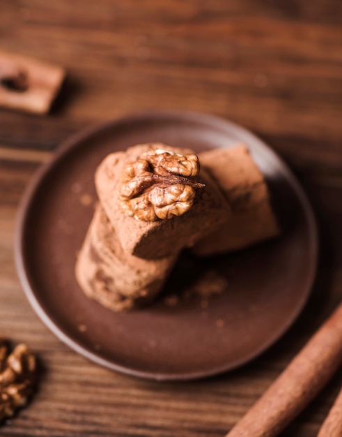 Close-up marshmallows covered in cocoa powder