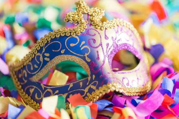 Close-up mask on confetti