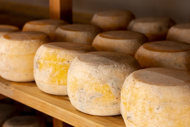 Close-up matured cheese wheels