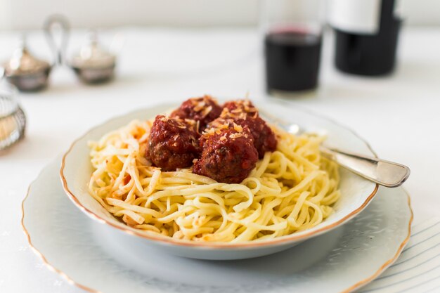 Close-up of meat balls on italian pasta in the bowl