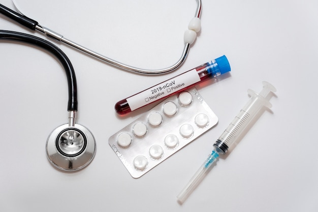 Close-up medical samples with stethoscope and tablets