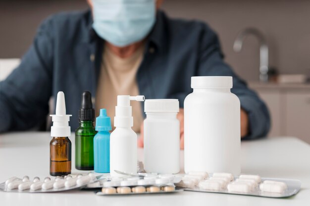 Close-up medicine containers on desk