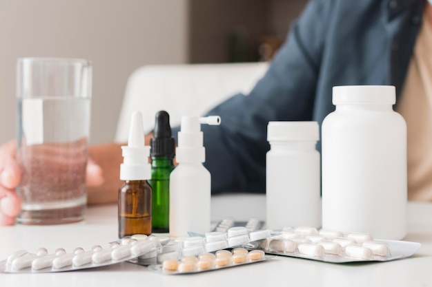 Close-up medicine containers on table