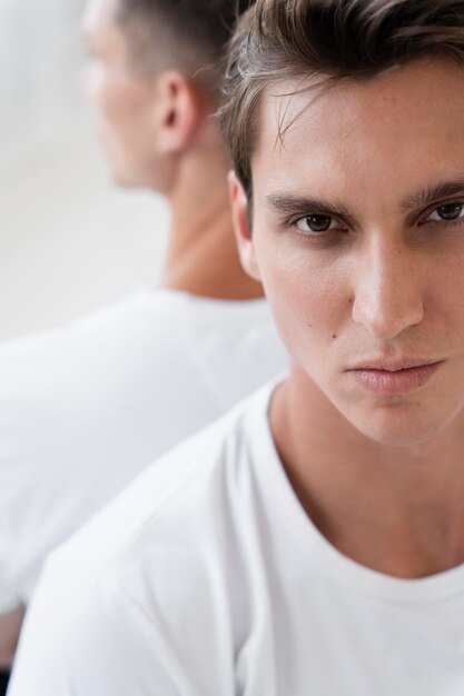 Close up men posing together