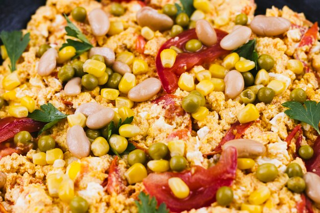 Close up mexican food with corns and beans