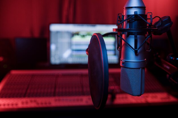 Close up microphone and pop filter in studio