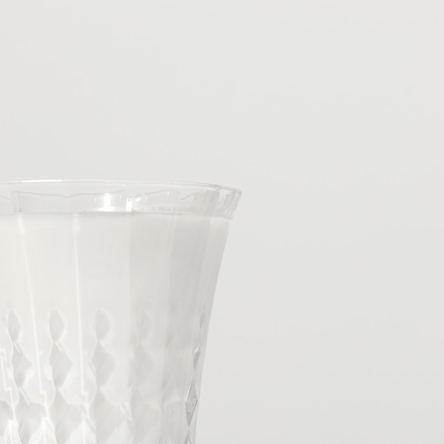 Free photo close-up of milk glass with copy space