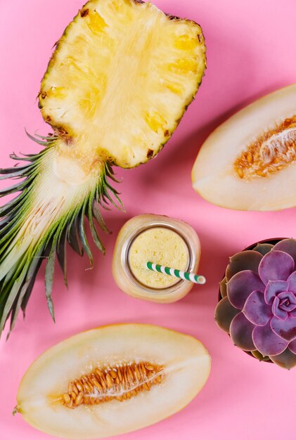 Close up of milkshake made from pineapple and melon