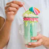 Free photo close-up milkshake with whipped cream