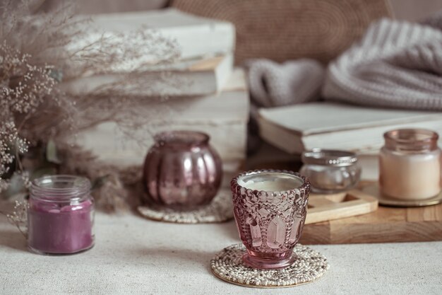 Close up of miniature candlesticks for candles. Home decor and comfort concept.