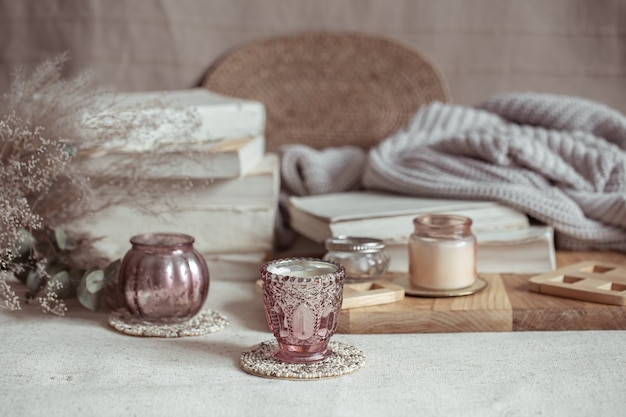 Close up of miniature candlesticks for candles. Home decor and comfort concept.