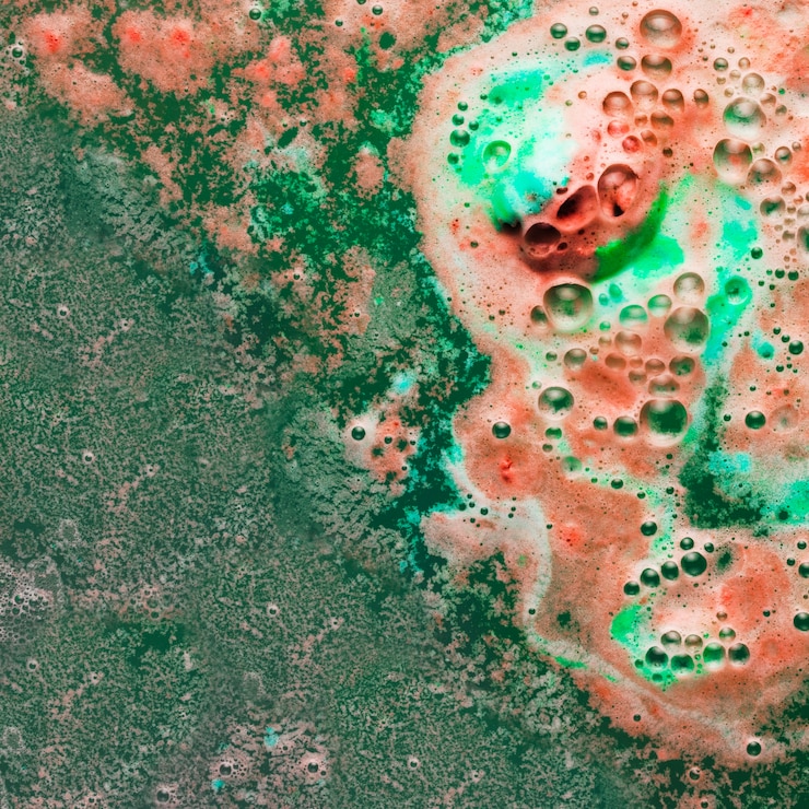 Free Photo close-up mix of emerald and peach foam