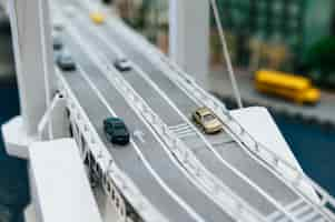 Free photo close up of model small cars on the overpass, traffic concepts.