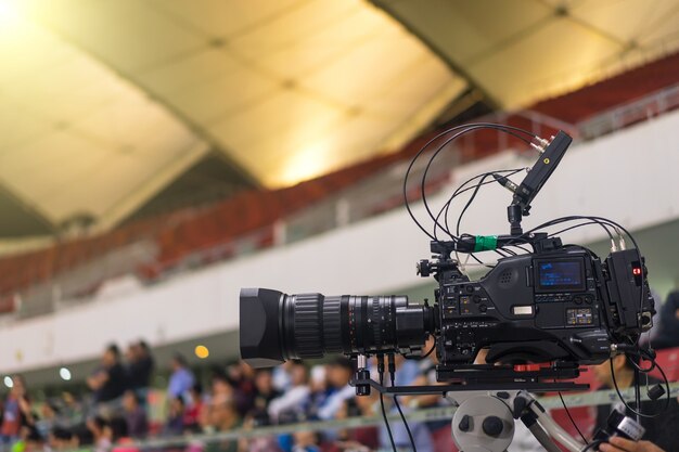 Close-up of modern video camera in a football stadium