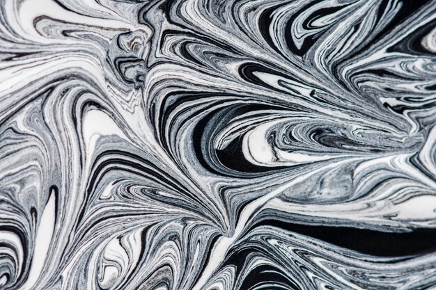 Close-up of monochrome paint swirls