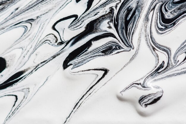 Close-up of monochrome paint swirls