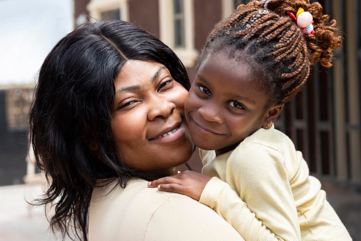 Free Photo close up mother holding girl