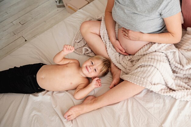 Close-up mother and son in the bedroom