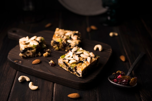 Close-up muesli batons on wooden board