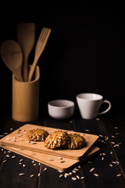 Close-up muesli cookies on wooden board