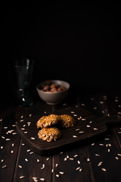 Close-up muesli cookies on wooden board