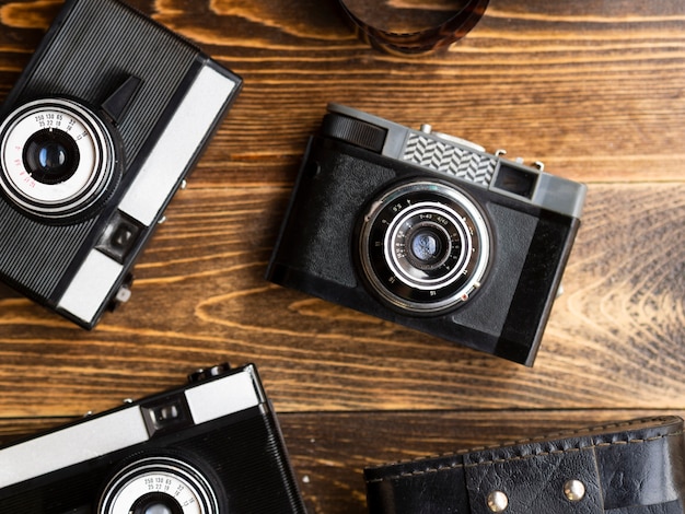 Close-up of multiple retro photo cameras