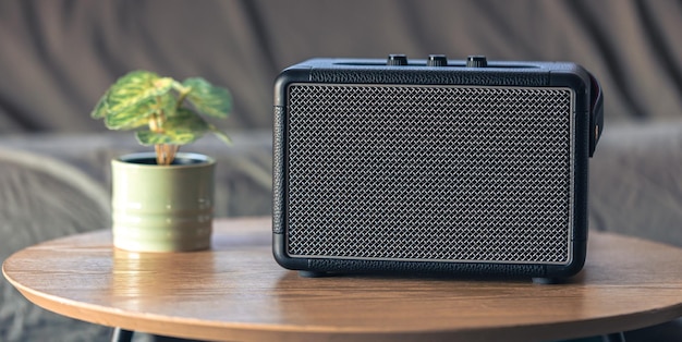 Free photo close up music speaker on a table in the interior of a room