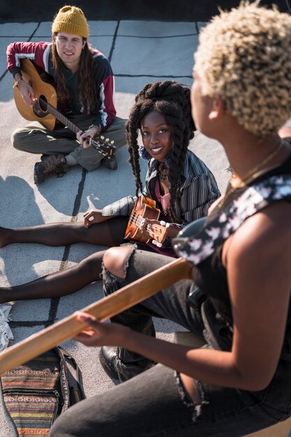 Close up musicians creating together