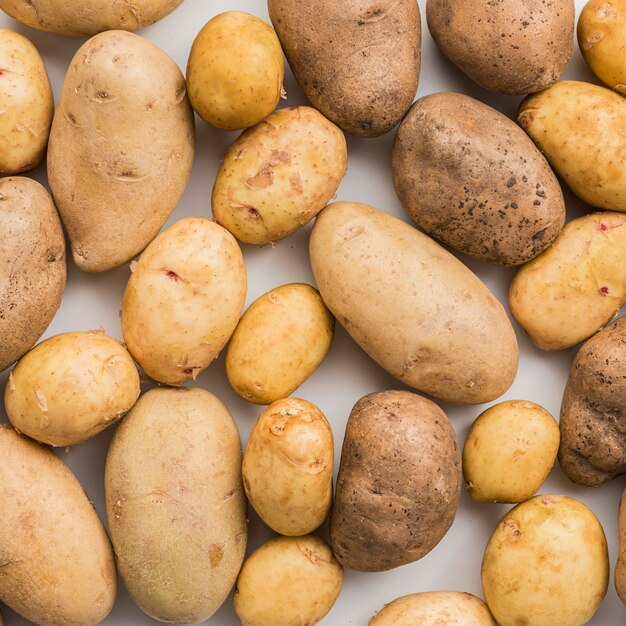 Close-up natural potatoes aligned