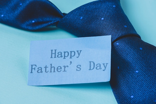 Close-up of necktie and note for father's day