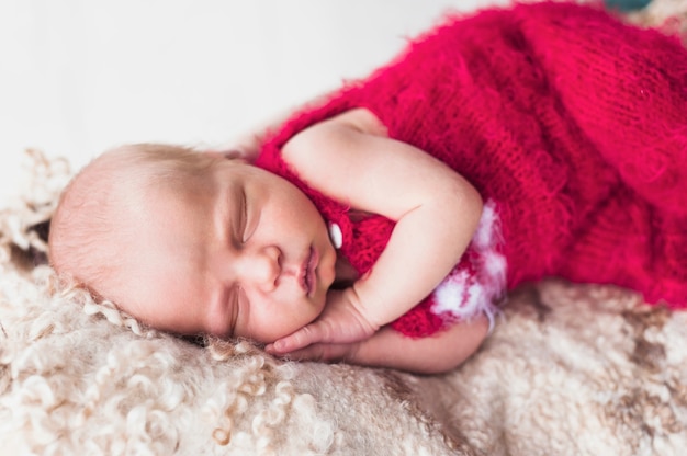 Close-up of newborn cuddling