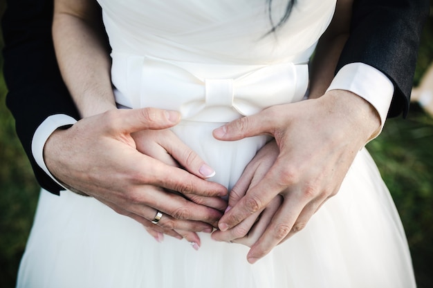 Close-up of newlyweds' hands