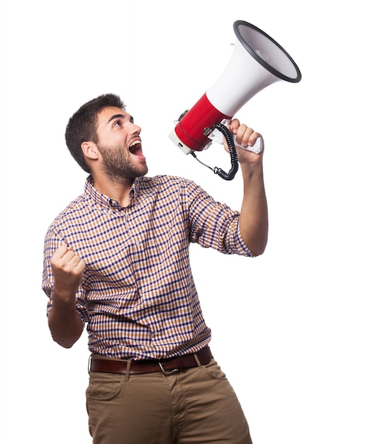 Close up of nice man, who screaming in the megaphone