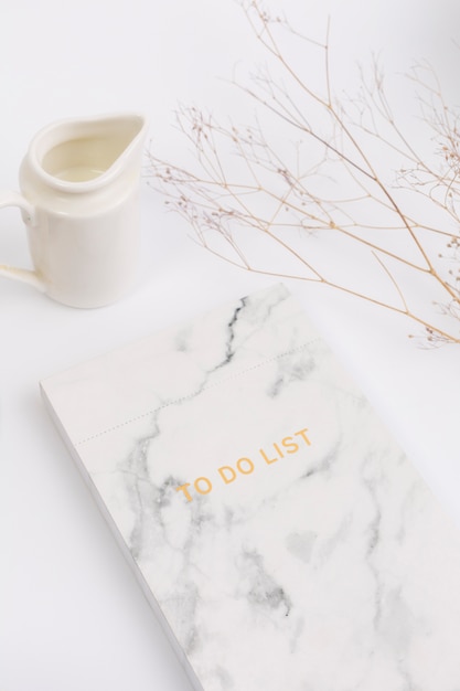 Free photo close-up of notepad with to do list text and milk