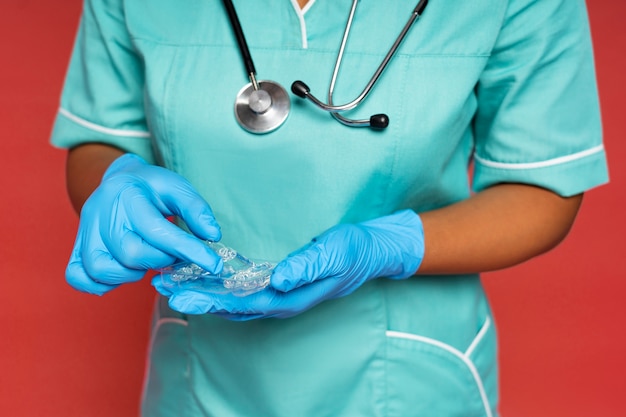 Free photo close up on nurse preparing vaccine